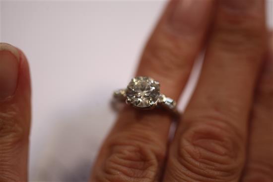 A 20th century platinum and single stone diamond ring, size K.